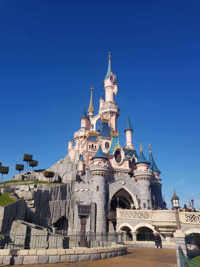 20 Reasons to love France. France is one of the most visited countries in the world. From the fantastic gastronomy (think croissants, baguettes, cheese and wine), the language to the stunning scenery, there are many reasons to love France. #France #Bastille Day #Explore #Travel Sleeping Beauty Castle at Disneyland Paris theme park - Reasons to love France