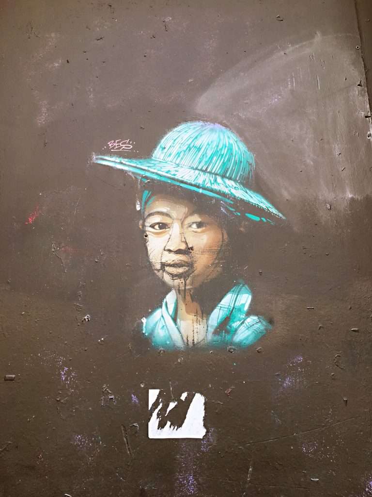 Lady with the hat by Guaté Mao - Street art Montpellier