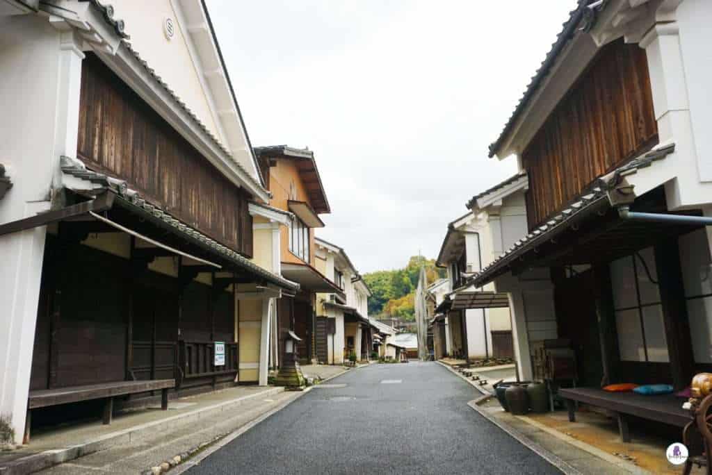 Quiet street in Ozu Old Town, Japan with traditional wooden roofs