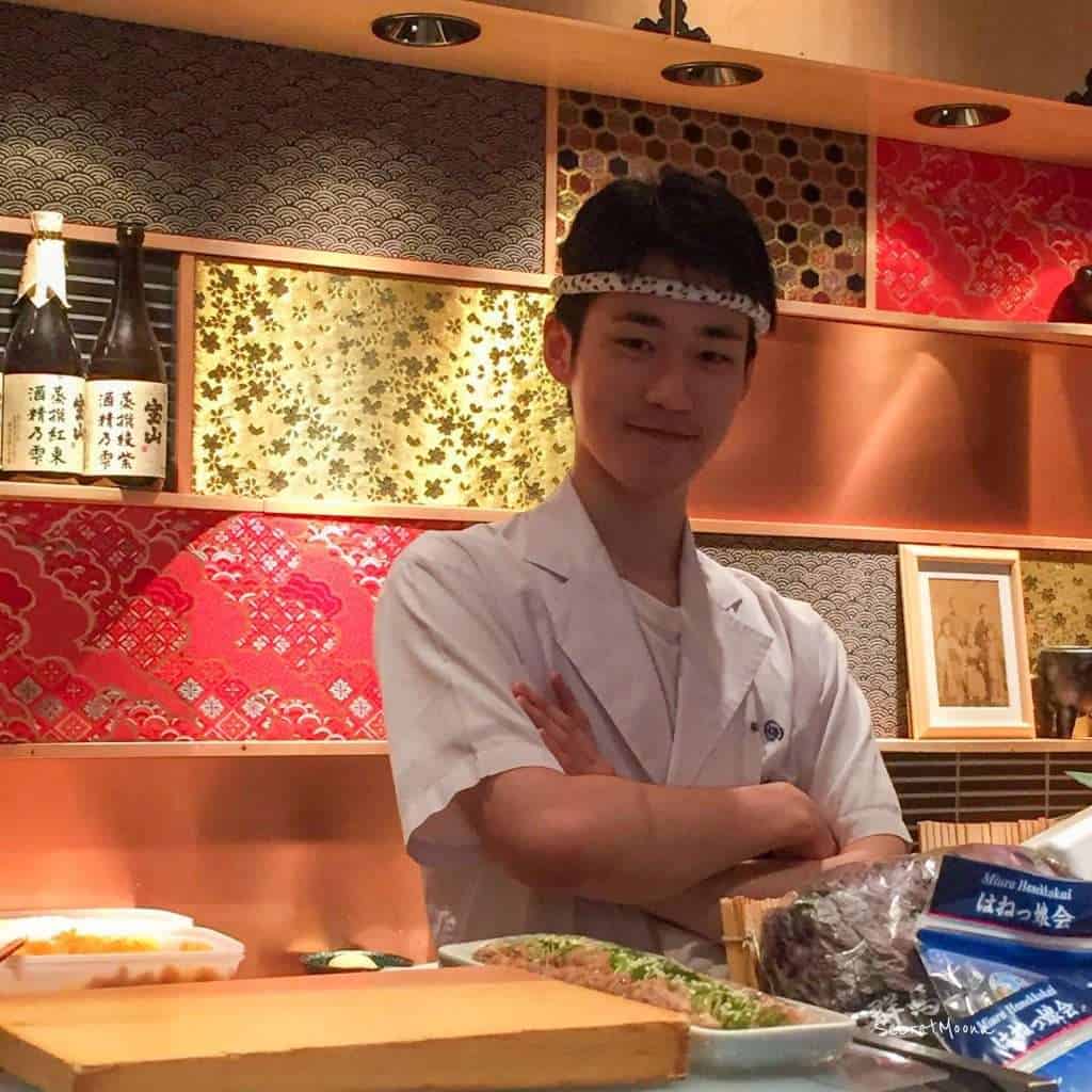 Young sushi chef with folded arms and smile - Tokyo Ginza
