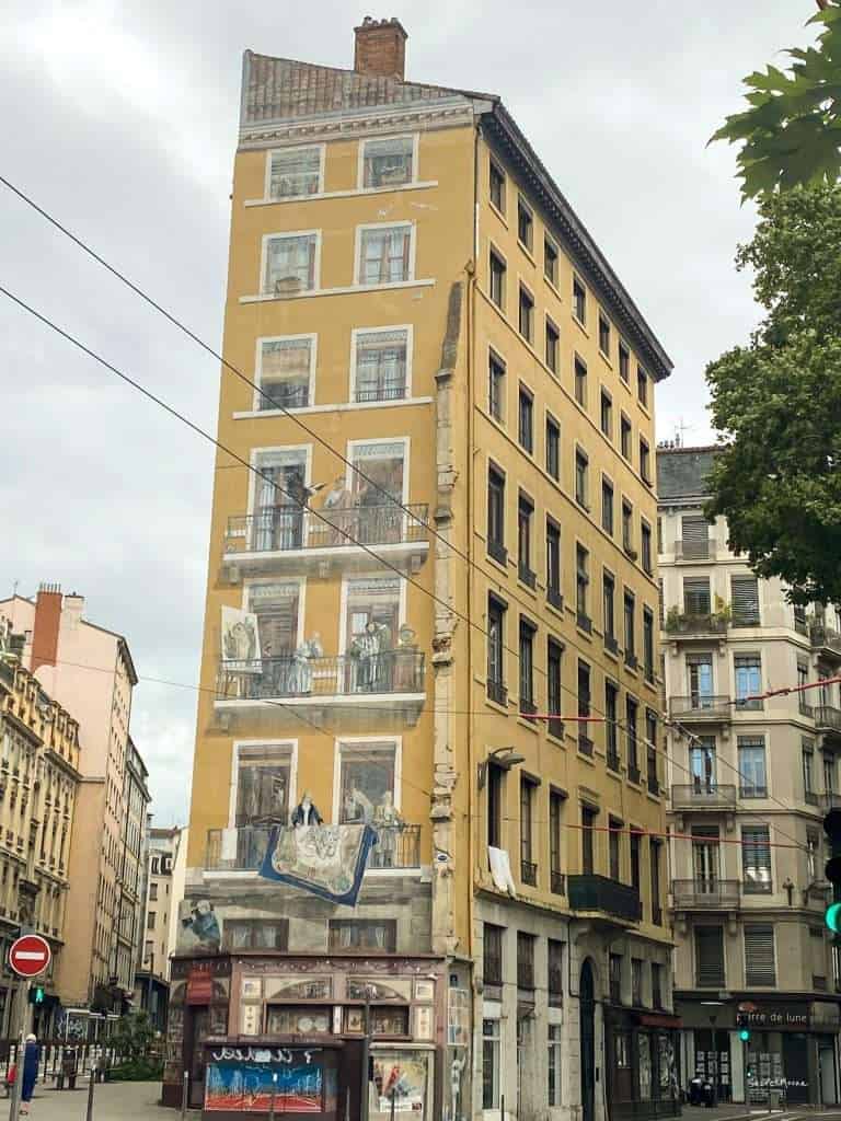 20 Incredible Things to Do in Lyon, France 34 Fresque des Lyonnais side view