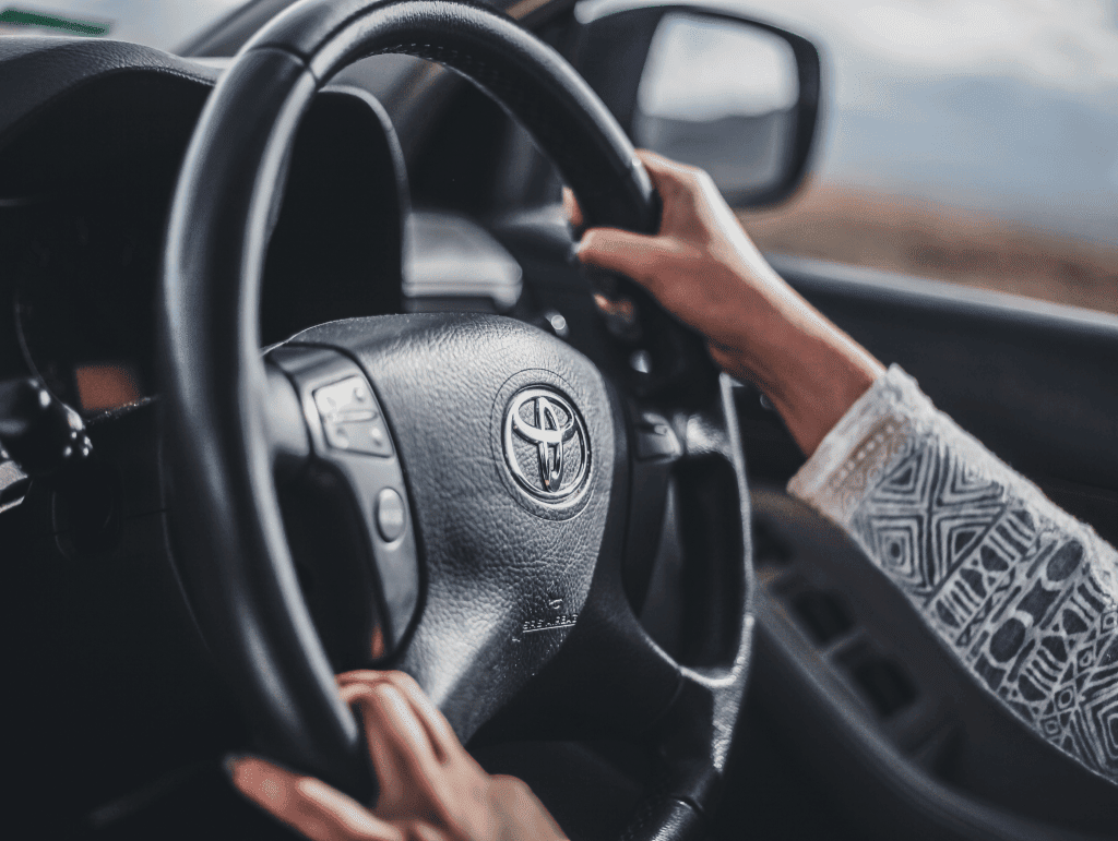 The Ultimate Guide to Driving in France: Tips for European and International Travelers 22 Hand on steering wheel