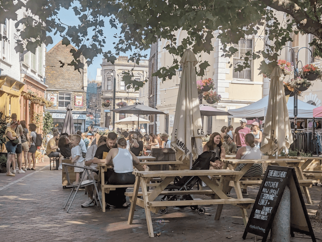People enjoying food at restaurant terrace - Margate, Kent