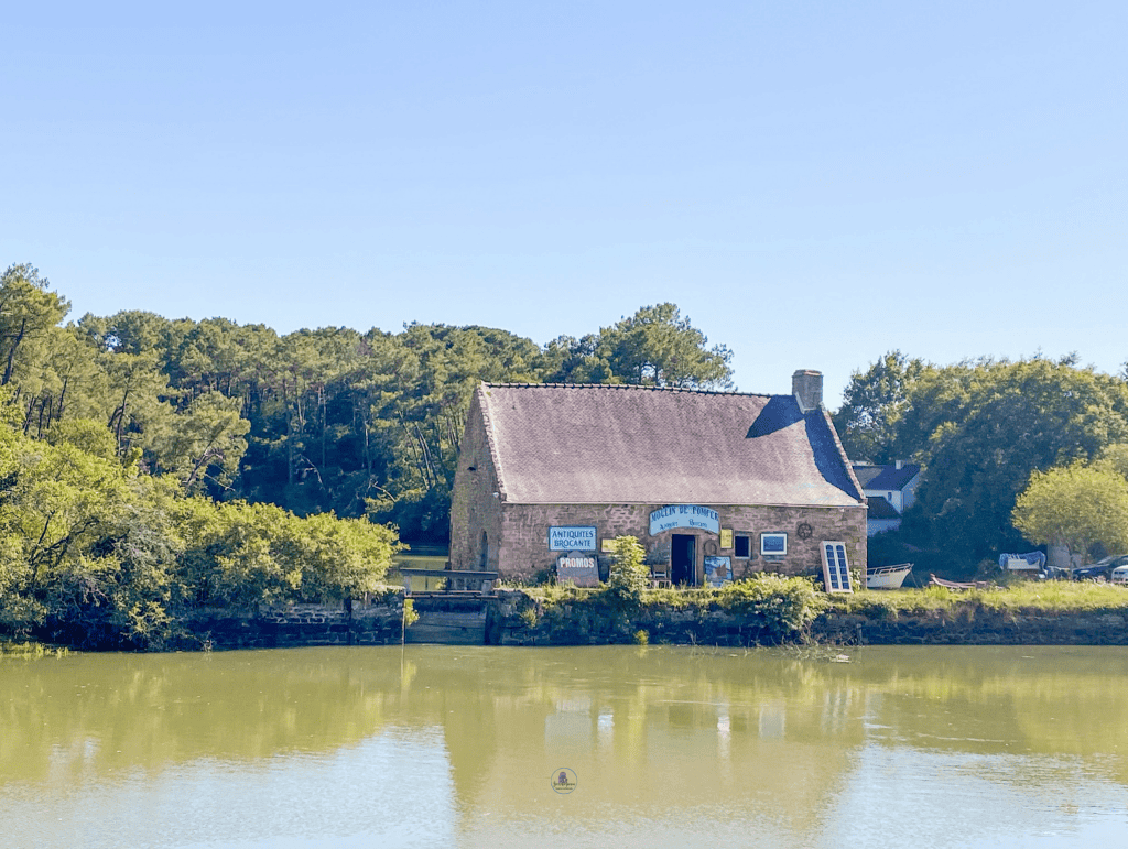 Things To Do In Brittany, France: A Journey Through Scenic Landscapes, And Authentic Culture. 4 A charming house next to a body of water in Brittany France