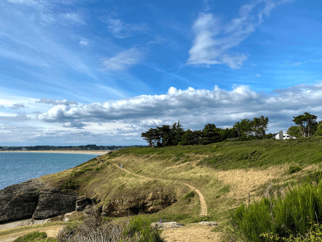 Things To Do In Brittany, France: A Journey Through Scenic Landscapes, And Authentic Culture. 30 A hiking path leading to a body of water - St Gildas, Brittany France