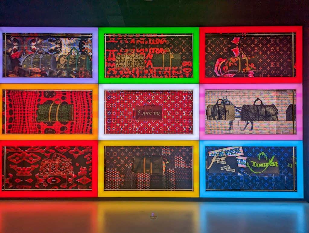 LV DREAM: Into the World of Travel Trunks 18 Display of Louis Vuitton backs with colourful backgrounds