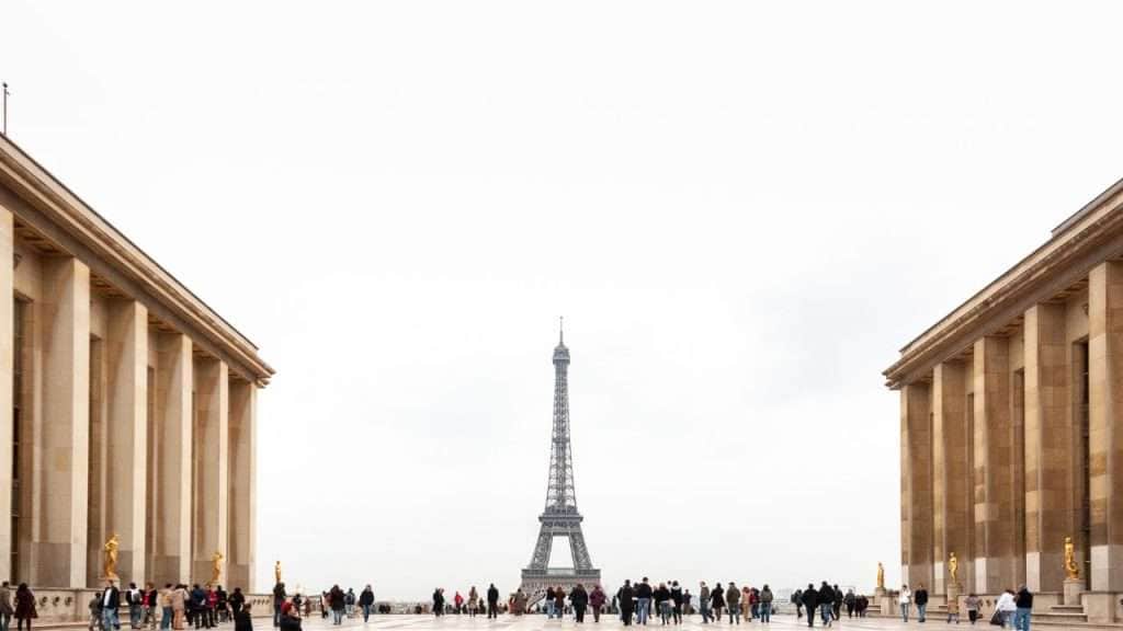 Tourists in Paris with Eiffel Tower in Background - Paris Olympic venues