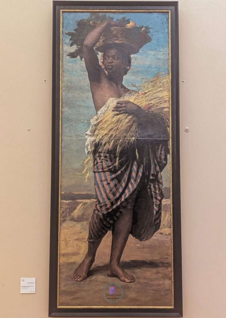 A Weekend Getaway: How to Make the Most of 2 Days in Grenoble 20 Portrait of a woman holding a basket on head - Musee de Grenoble, France