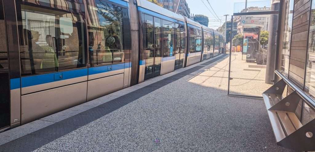 Tram at a tram stop in Grenoble