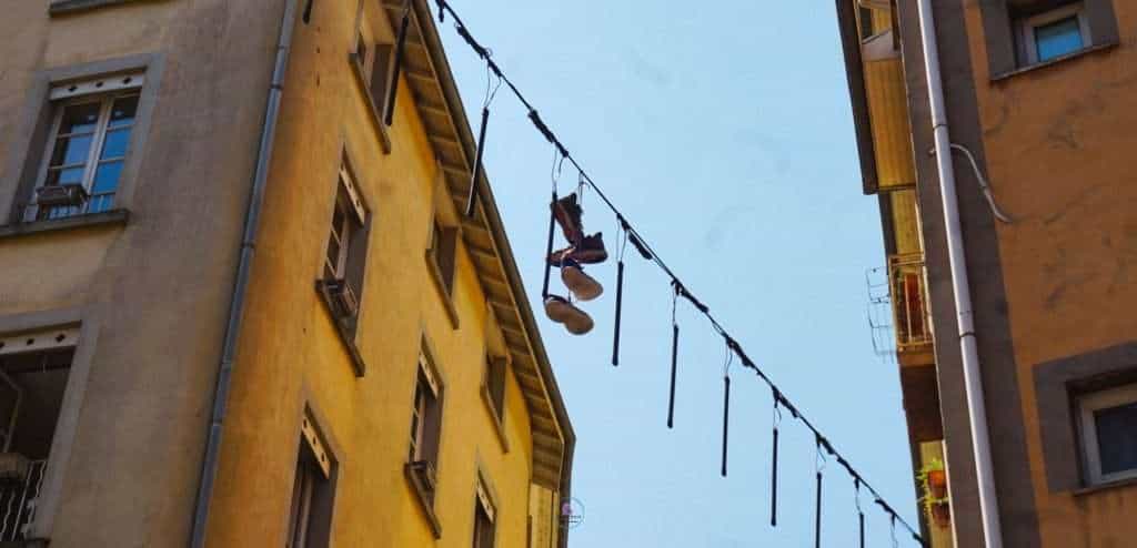 Shoes hanging over power lines