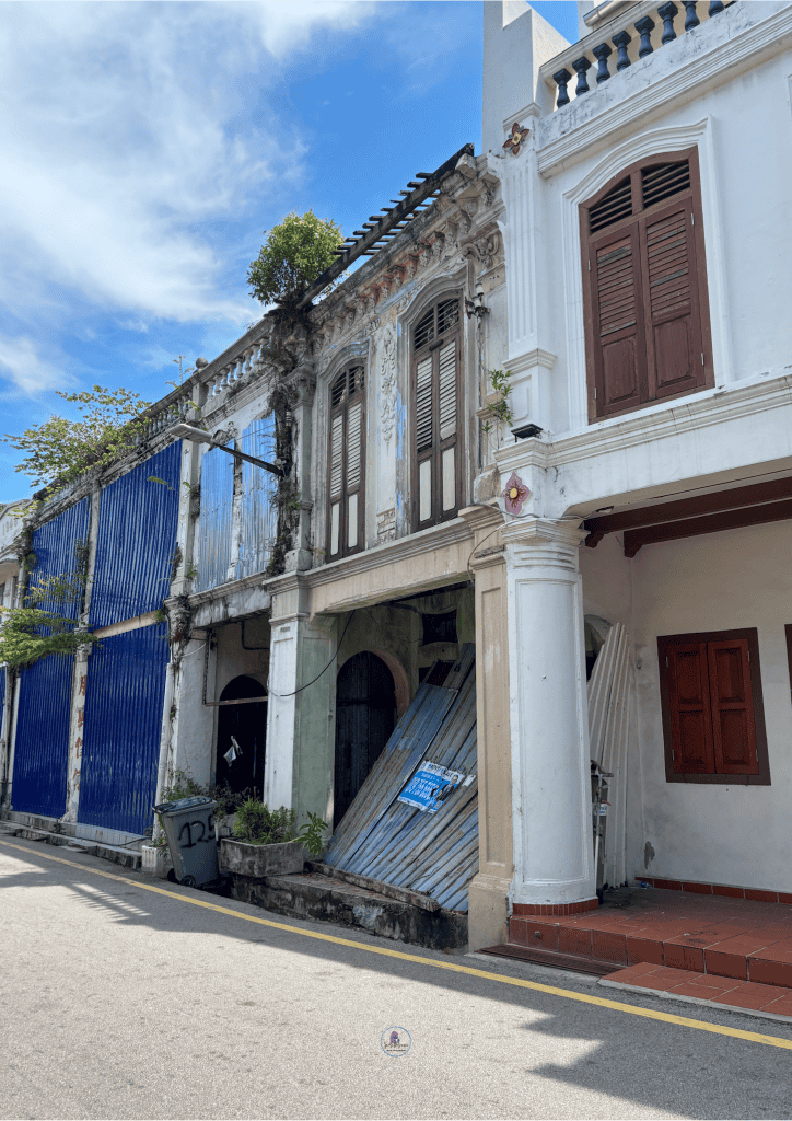 Clear blue sky with soft white clouds, setting the scene for an exciting Malaysia itinerary.