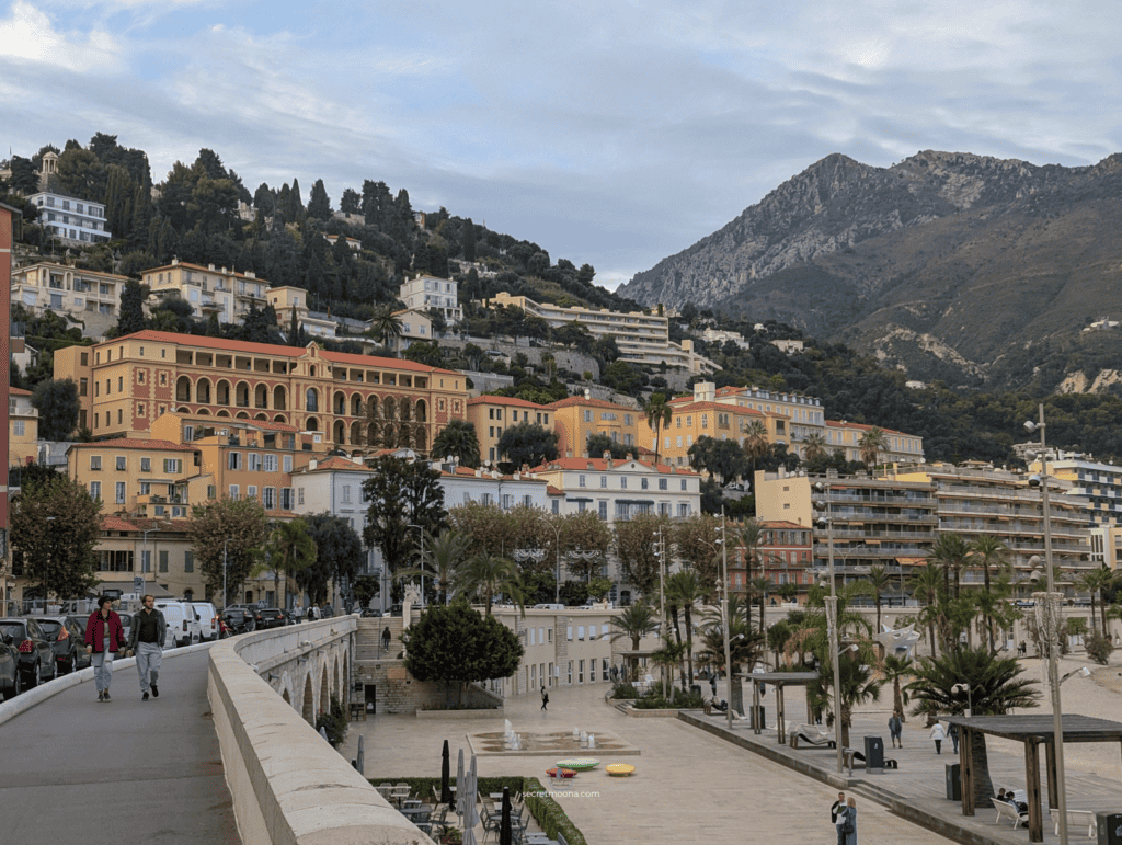 The Perfect One Day in Menton Itinerary: Discover Hidden Gems 6 An urban landscape showcasing a church and a tower,