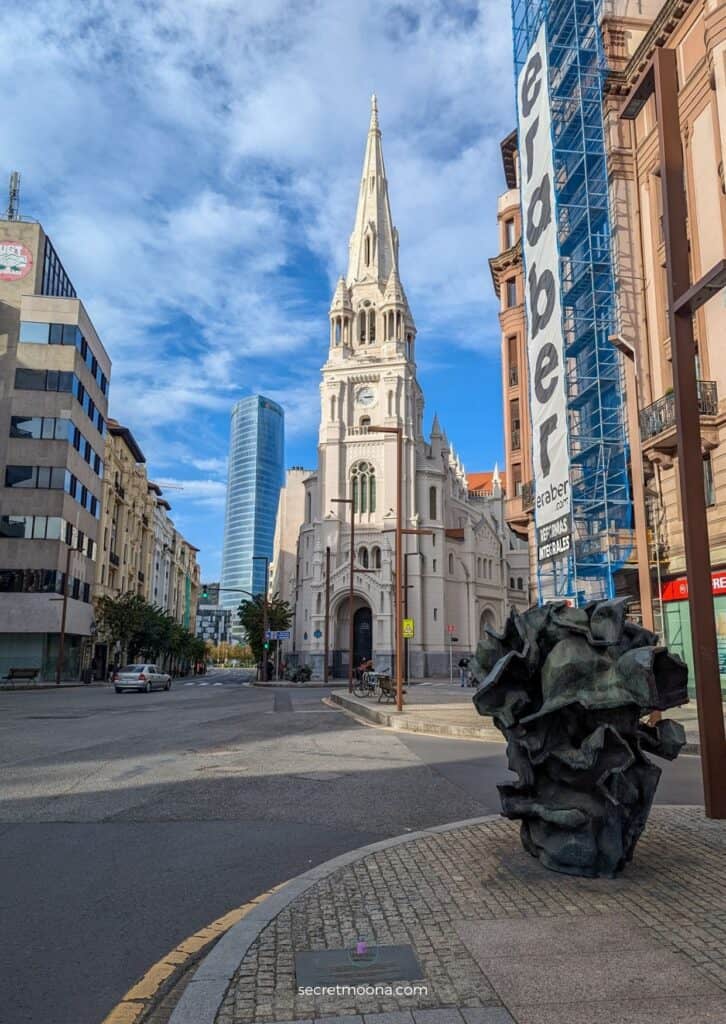 How to Experience the Best of Bilbao in Just 3 Days 18 View of a church in Bilbao with a sculpture in front of it