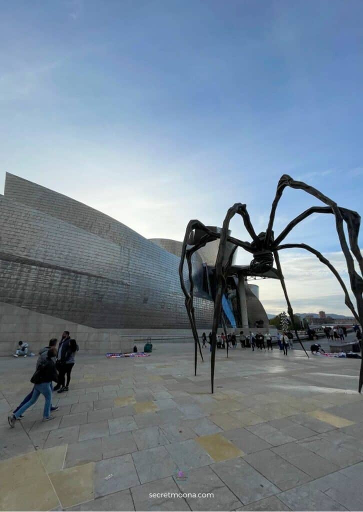 How to Experience the Best of Bilbao in Just 3 Days 15 People looking at Maman, the iconic spider by Louise Bourgeois