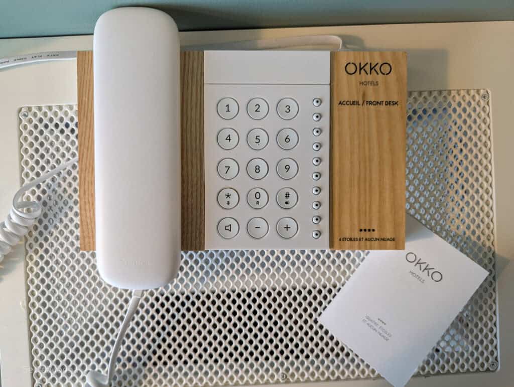 Where to Stay in Nice: OKKO Hotels Nice Aéroport, France 26 Telephone on bedside table in Standard Room at OKKO Hotels Nice Aéroport, France
