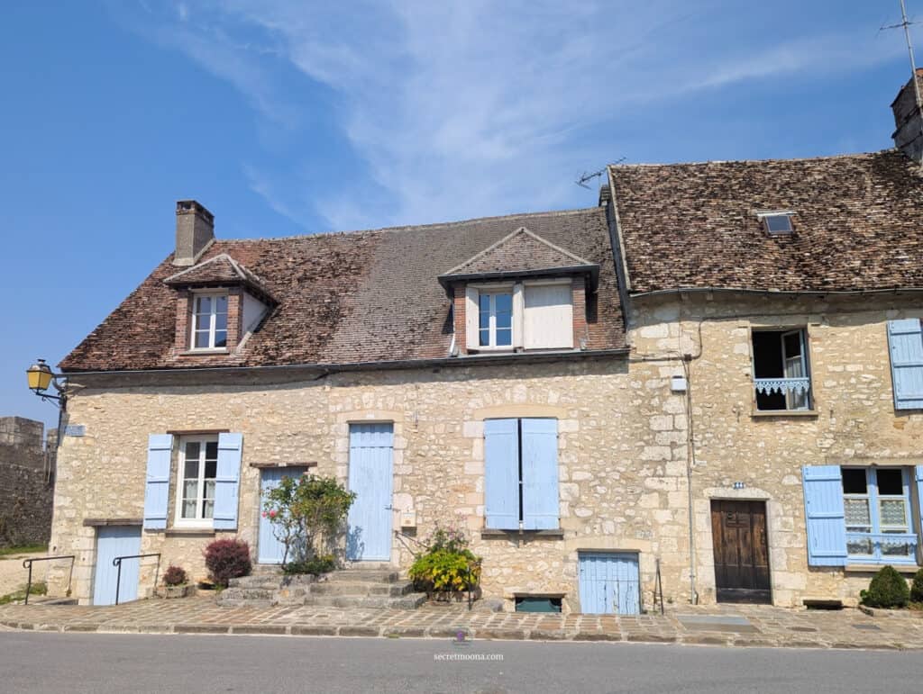 House with blue door and window frames in Provins France