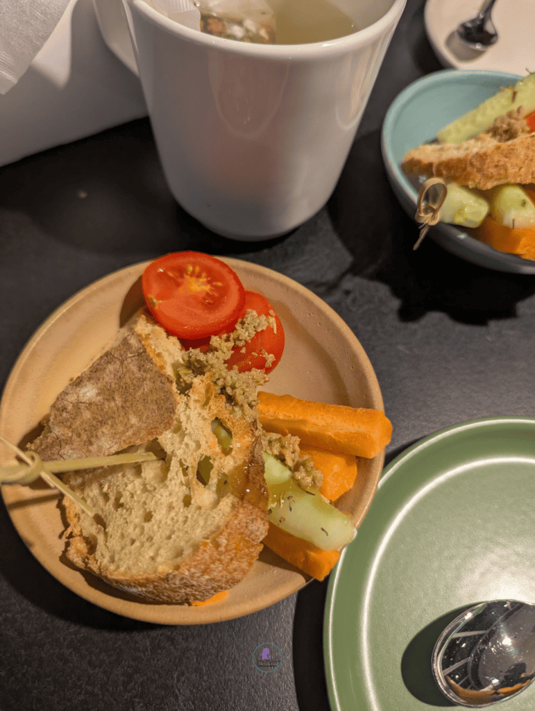 Delicious vegetable bread with fresh dip, perfect for a light snack or appetizer in a charming resta.