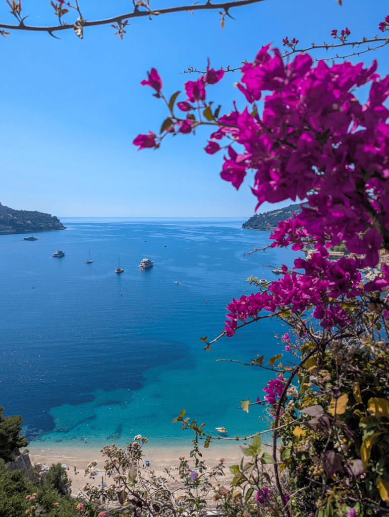 How To Spend One Day In Villefranche-sur-Mer: Things To Do 22 Panoramic view of Villefranche-sur-Mer bay with sailboats and pastel houses -n one of the best things to do in Villefranche-sur-Mer