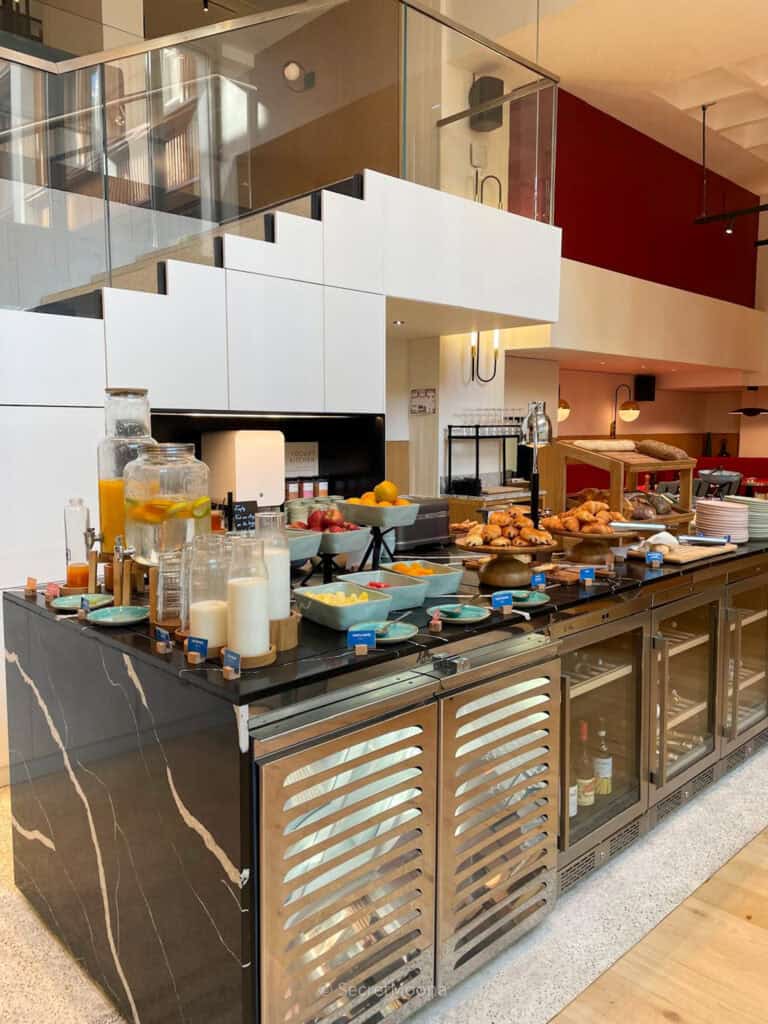 TRIBE Paris Pantin Review: Is This Stylish Hotel Near La Villette Worth It? 6 Breakfast buffet at TRIBE Paris Pantin with fresh fruit, yoghurt, cereals and pain au chocolat