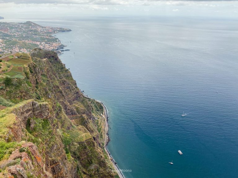 The view down Madeira's south coast from the Cabo Girão skywalk, 580 metres above the sea