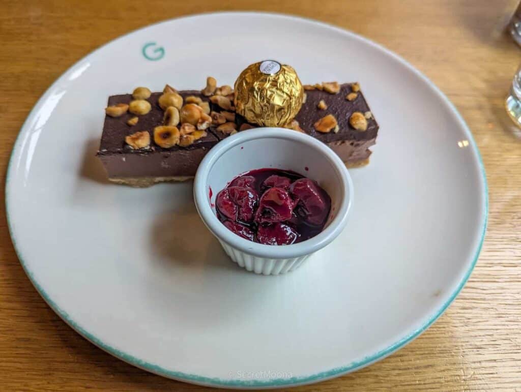 Chocolate hazelnut dessert with cherry compote