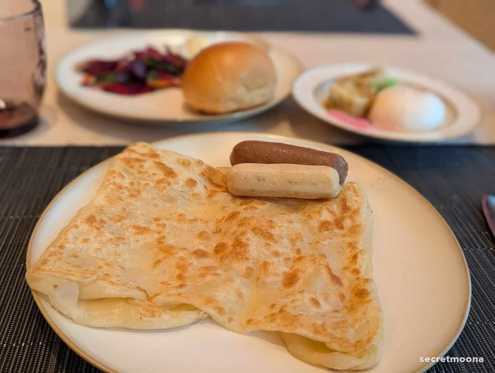 A breakfast plate with roti canai at Gingerfire, Hilton Burau Bay Langkawi